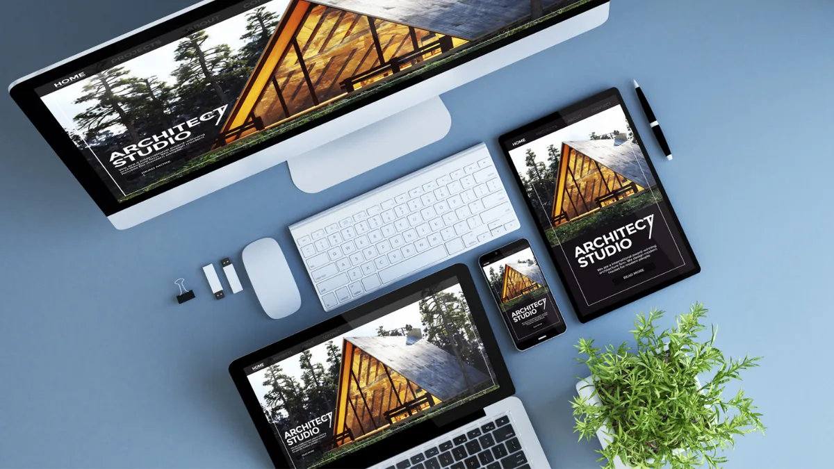 A website design shown across a desktop monitor, laptop, tablet and phone